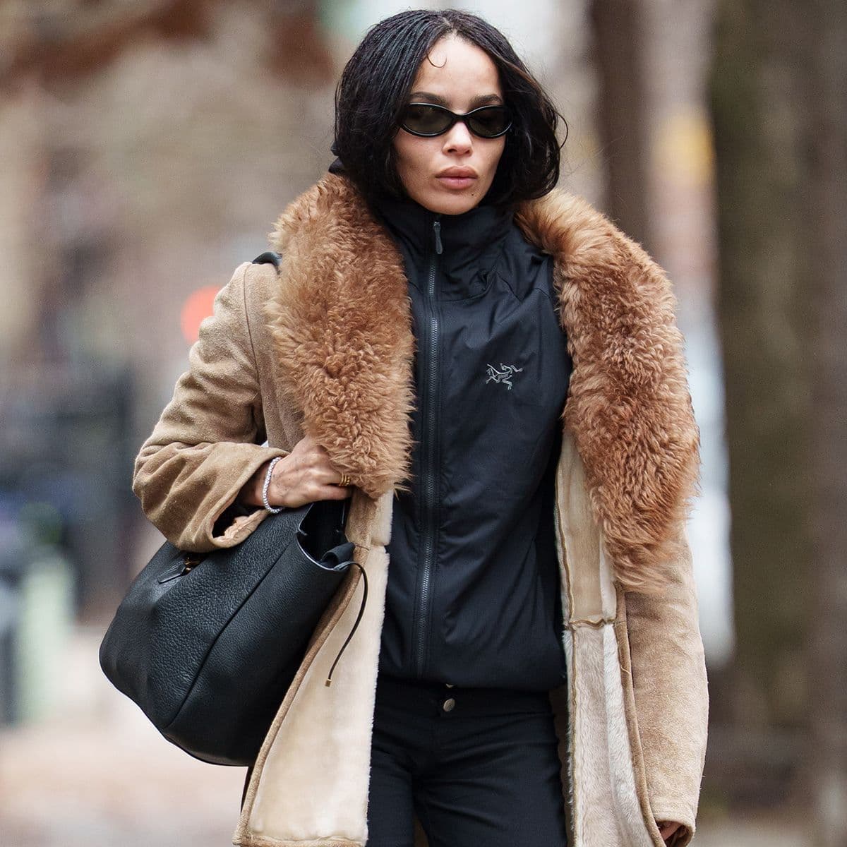 Sorry, Jeans—Zoë Kravitz Keeps Wearing This Elegant Trouser Trend With Boots Instead